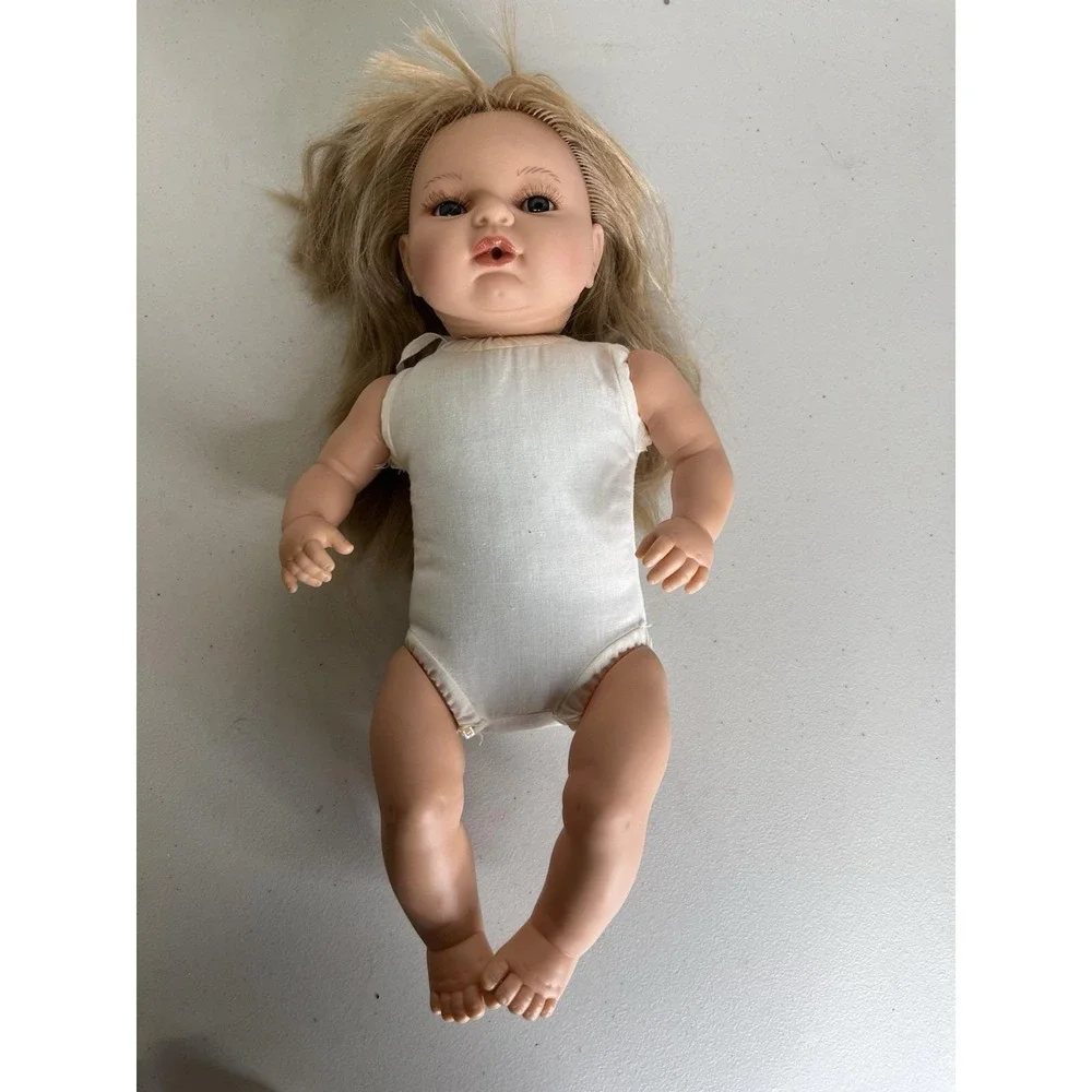 Berbesa Baby Doll Large Soft‎ Body, blonde Hair blue Eyes.